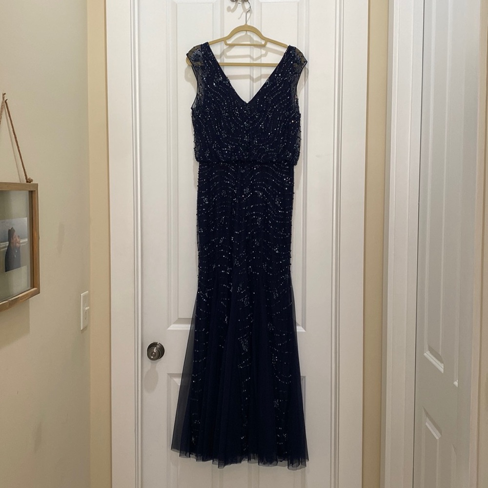 Beaded evening gown with blousson waist detail